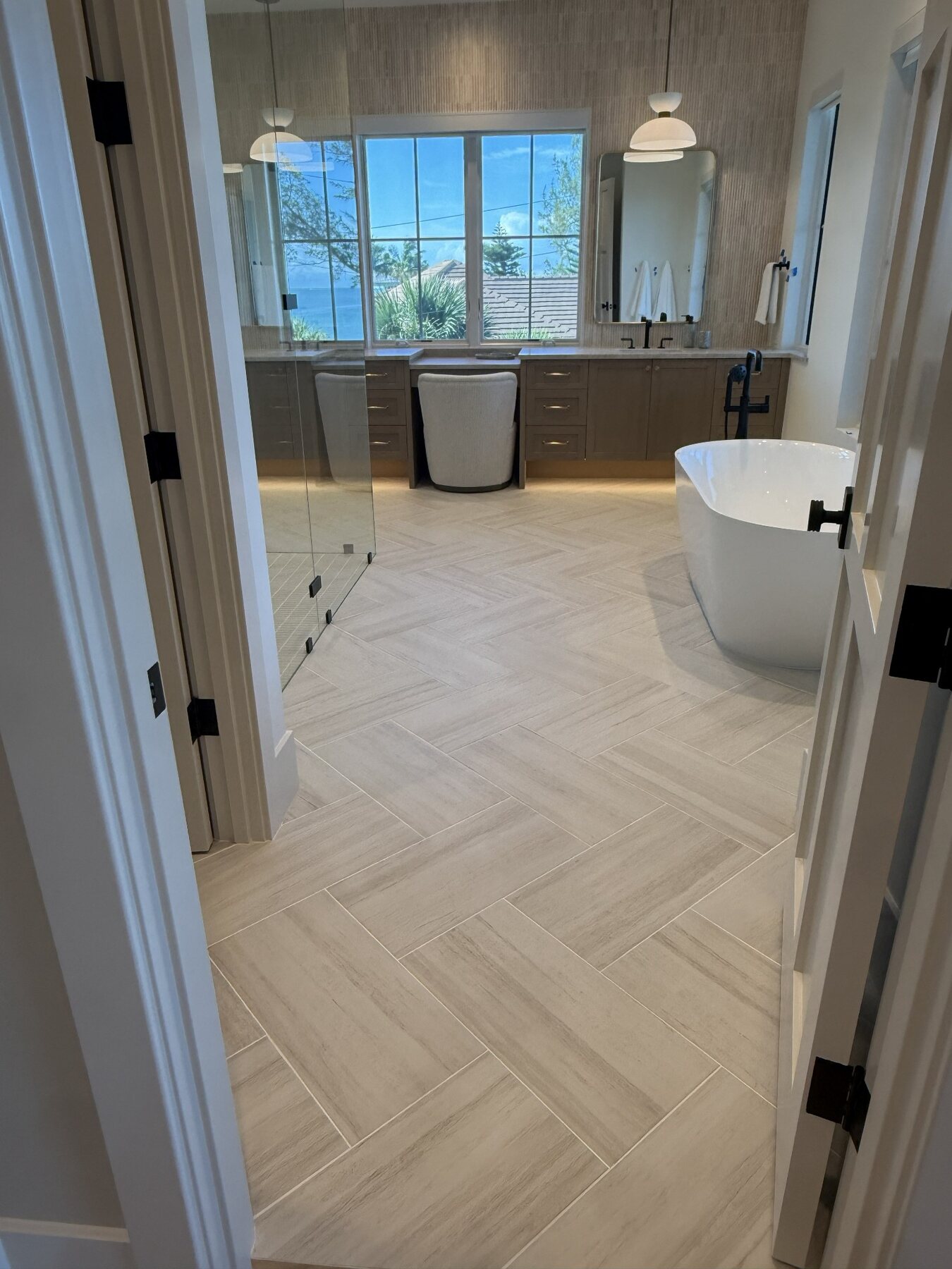Luxury bathroom with patterned tile floor