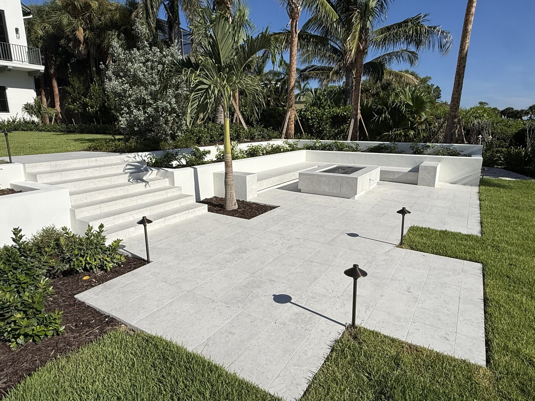 Outdoor pool deck and landscape tile installation